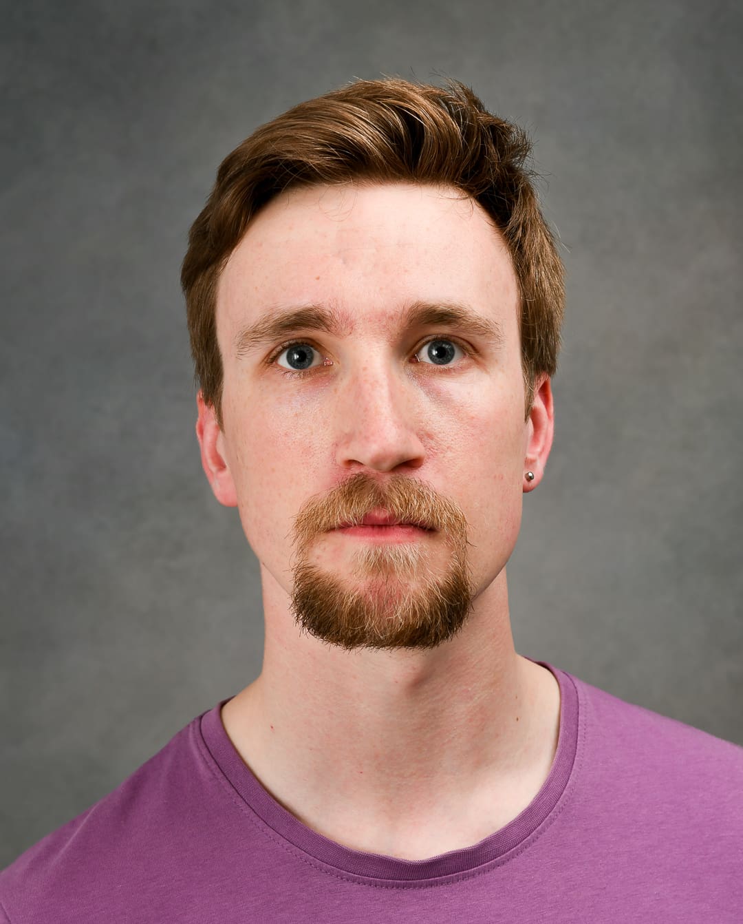Corporate Headshot of Connor Thomas
